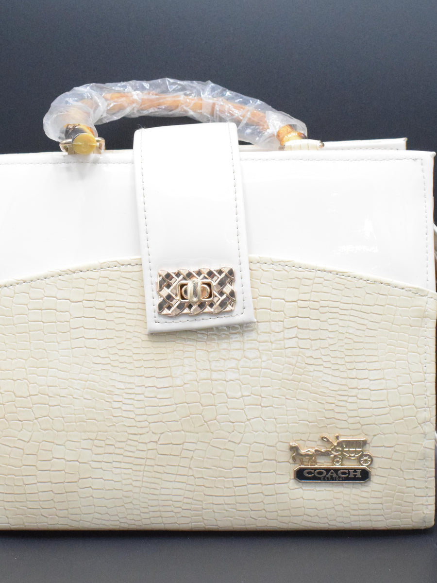 Shop White Pure Quality Coach Hand Bag at 4feet